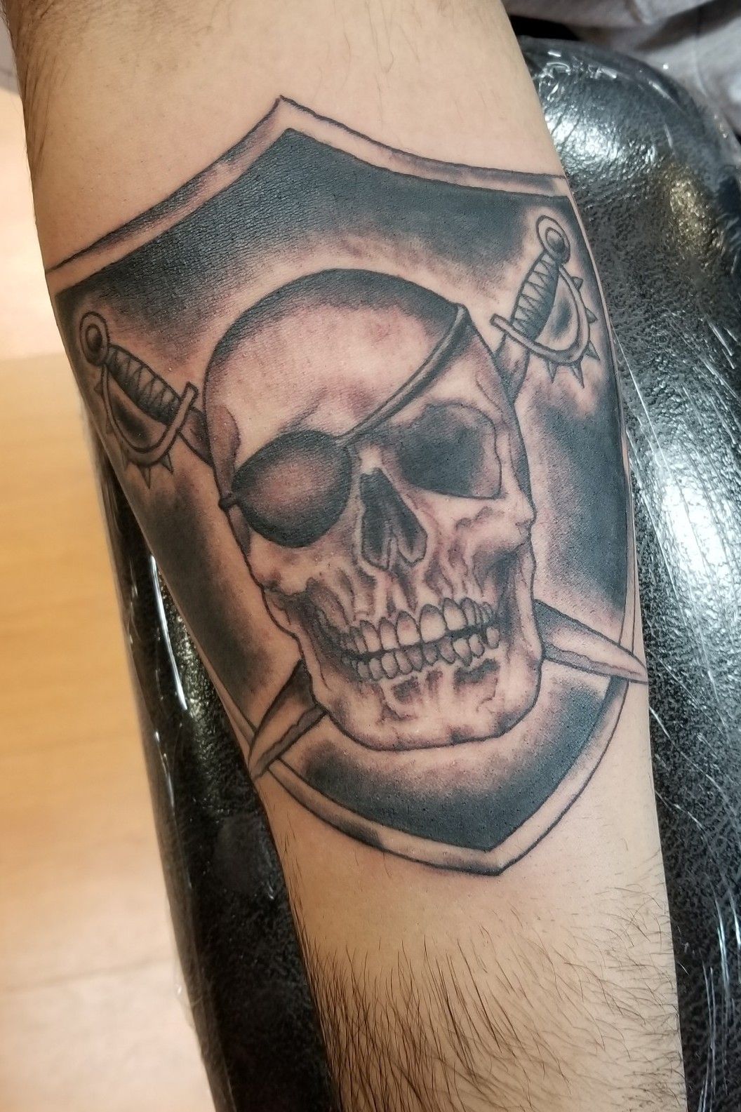 Oakland Raiders Skull Tattoo On Biceps