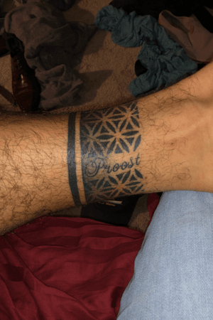 Tattoo uploaded by William Schmidt • Flower of life band with “proost”  (“cheers” in dutch) inked at bobs tattoos in rotterdam. By Mark. • Tattoodo
