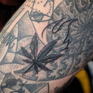 Tattoo by Sitapurk #Sitapurk #blastovertattoo #blastovertattoos #blastover #coverup #weed #weedleaf #420 #fire #linework #illustrative #blackwork