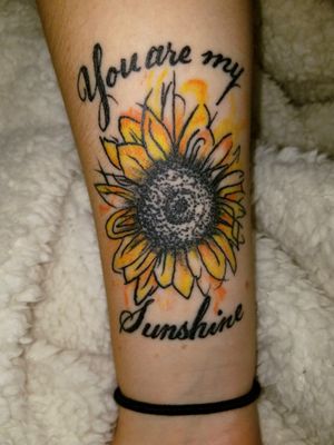 First tattoo 9~28~18 #sunflower #firsttattoo #youaremysunshine #flower #flowertattoo #watercolor #watercolortattoo #yellow #orange #black #inkedgirl #ink #inked #inktober #meaning #inmemory #cancersucks 