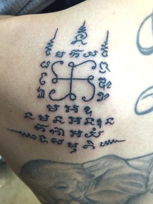Laos prayer tattoo