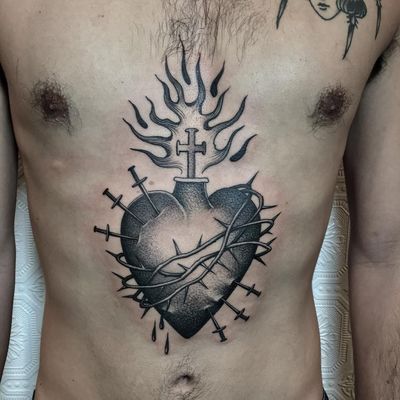 Tattoo by Justin Olivier #justinolivier #torsotattoos #torso #blackandgrey #sacredheart #heart #fire #love #catholic #religious #thorns #swords #cross