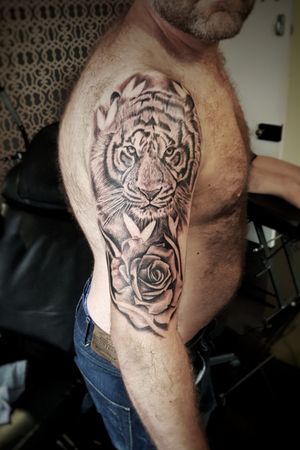 Rose and tiger done by Arthur frost owner of illuminarti studios