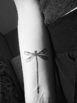 Delicate black and white dragonfly tattoo done 5/23/18