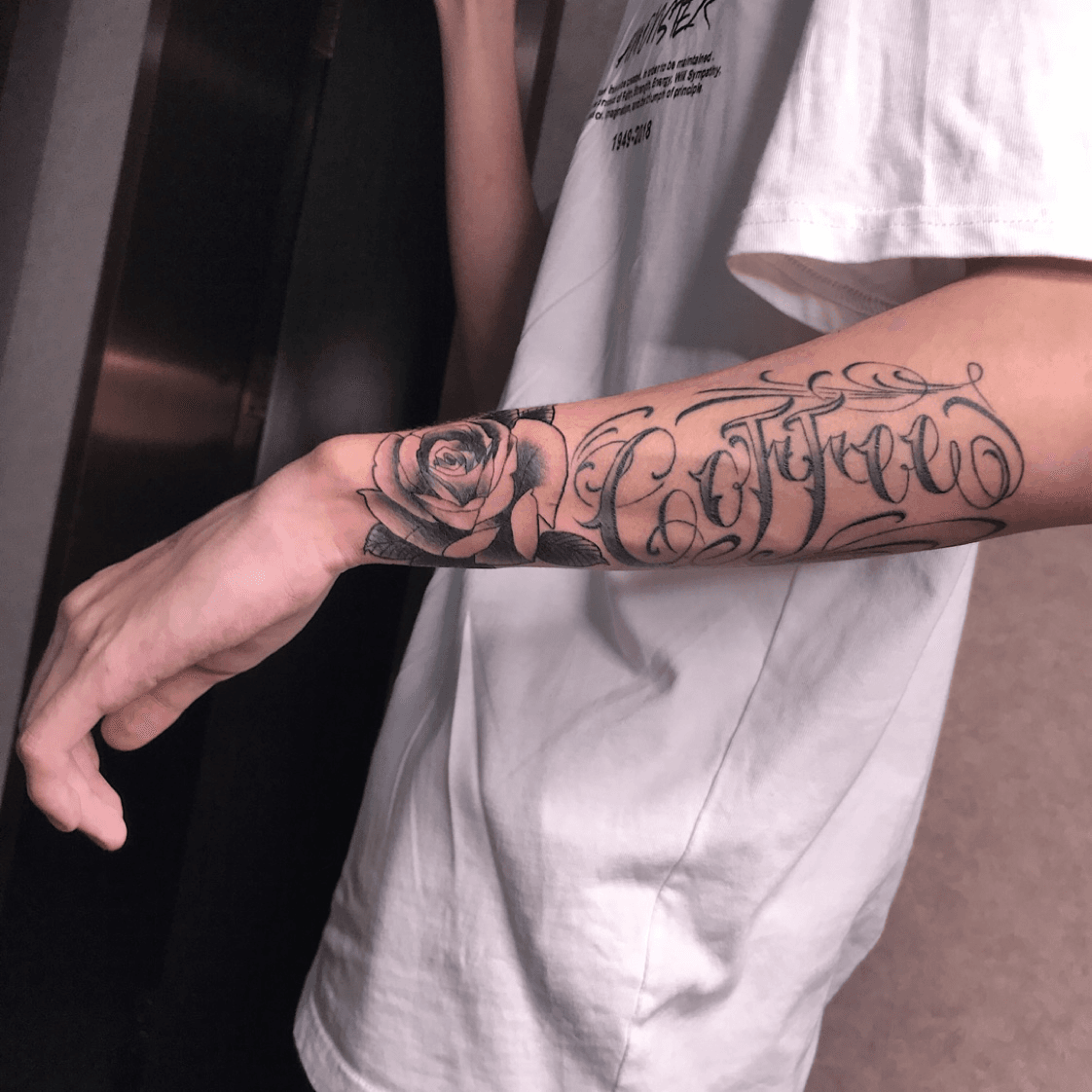 outer forearm name tattoos