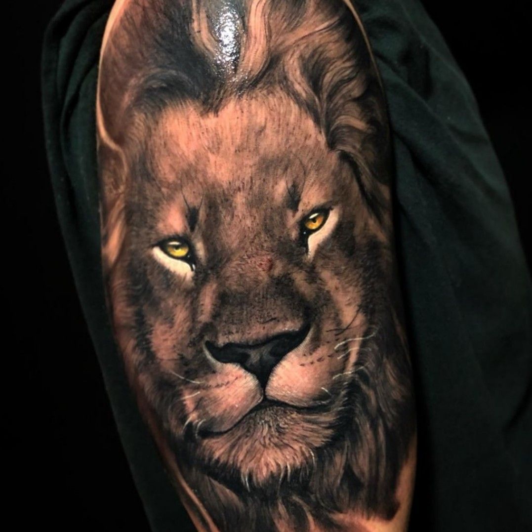 Lions tattoo by El Mago