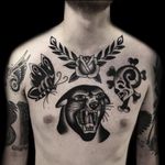 Tattoo by Austin Maples #AustinMaples #blackpanthertattoos #blackpanther #junglecat #cat #blackandgrey #traditional #skull #skullandcrossbones #butterfly #rose #leaves