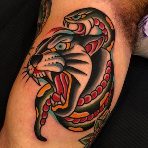 Tattoo by Samuele Brigante #SamueleBrigante #blackpanthertattoos #blackpanther #junglecat #cat #color #traditional #snake #reptile #animal #nature