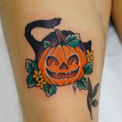 Tattoo by Andrew Mongenas #AndrewMongenas #HalloweenTattoos #Halloween #Samhain #spooky #trickortreat #pumpkin #cat #kitty #flowers #floral #leaves #nature