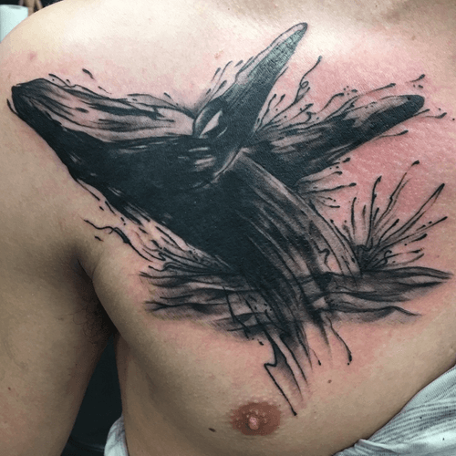 Whale on a chest as his first tattoo 