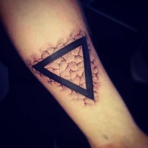 Symbol for water, cracked skin By Peanut, Resurgence Tattoo Studio