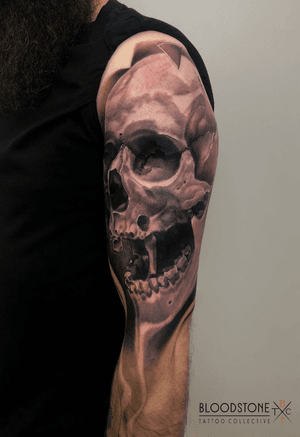 Large black and grey skull. Sleeve in progress by Nathan Hamilton