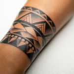 Polynesian tribal wrapped around the wrist.
