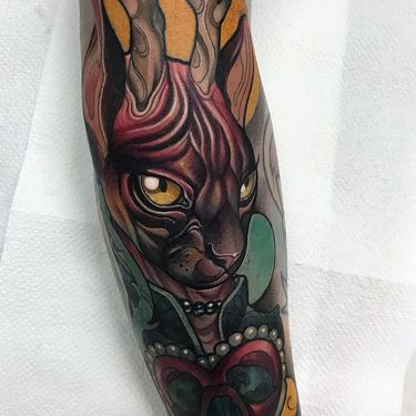 Tattoo by Oash Rodriguez #OashRodriguez #newschooltattoo #newschool #color #cat #heart #sphinx