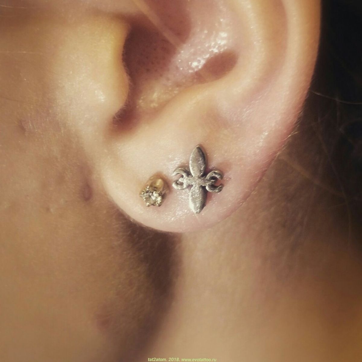 Tattoo uploaded by Вадим • Пирсинг мочки уха. Второй прокол. Украшение ...
