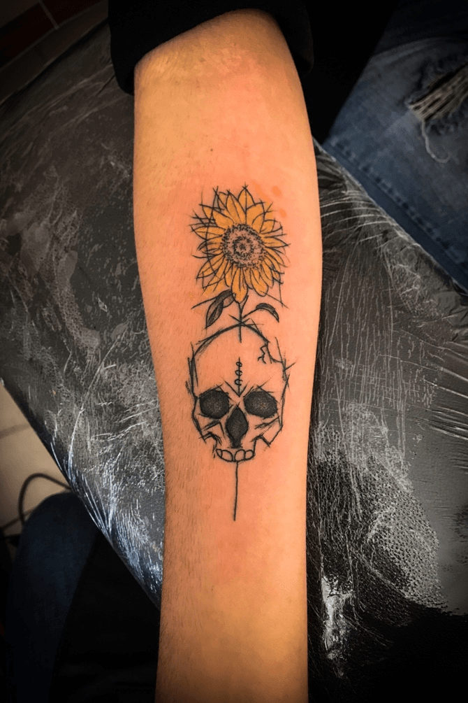 Tattoo uploaded by illson  Skull  Sunflower blackwork blackandgrey  linework skull sunflower newschool traditional flower arm illson   Tattoodo