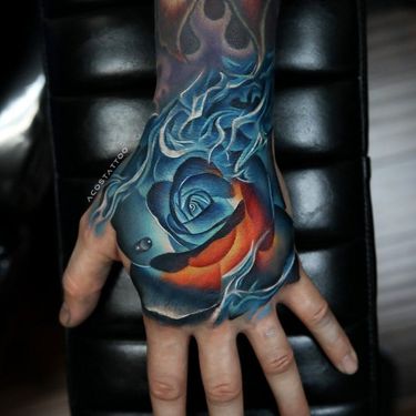Tattoo by Andres Acosta #AndresAcosta #newschooltattoo #newschool #color #rose #flower #fire