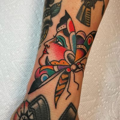Gapfiller done by #jazzytats #traditionaltattoos #girlface #insects #butterfly #rainbowcolor