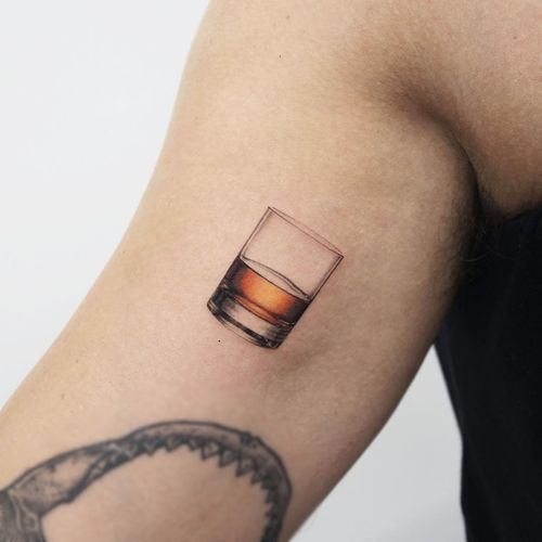 Tattoo by Youyeon #Youyeon #realismtattoos #hyperrealismtattoos #realism #hyperrealism #realistic #glass #whiskey #drink