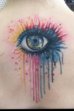 Watercolor rainbow eye tattoo
