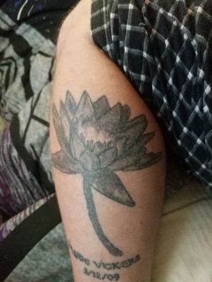 Lotus flower to represent my kids because they blossomed through the mud.