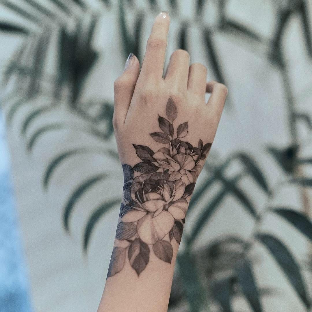 Hand Tattoos for Women 50 Beautiful Hand Tattoo Designs
