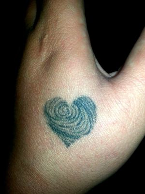 My wifes fingerprint redesigned in the shape of a heart. B&W. 10 minutes. $20. #brewcrewink #inkedup #blackandgrey #matchingtattoos 