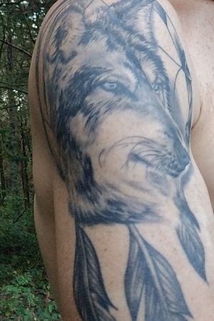 My tattoo. Wolf in a dream catcher. 