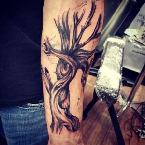 Gnarly tree half sleeve start. coverup of an old tattoo. 