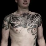 Tattoo by Tom Tom Tattoo #TomTomTattoo #favoritetattoos #favorite #blackandgrey #dragon #Japanese #irezumi #chesttattoo