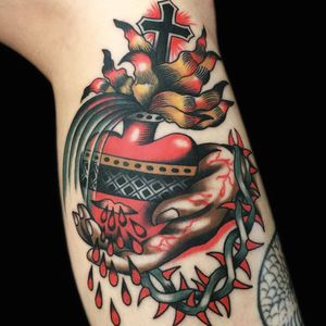 Tattoo by Chingy Fringe #ChingyFringe #favoritetattoos #favorite #traditional #heart #sacredheart #crownofthorns #fire #blood