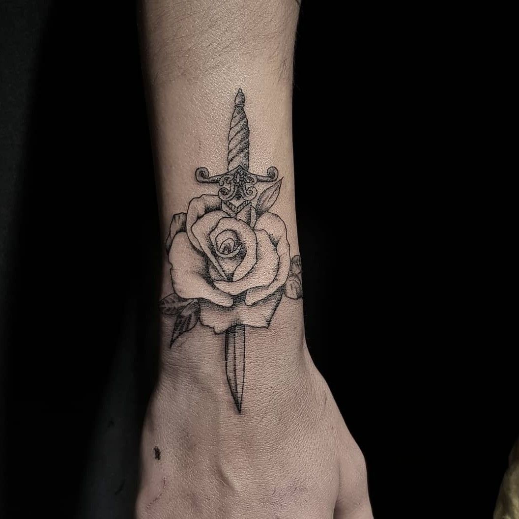 Tattoo uploaded by Abdullah Akbak • Rose tattoo #rosetattoo #rose #dagger  #ink #arts • Tattoodo