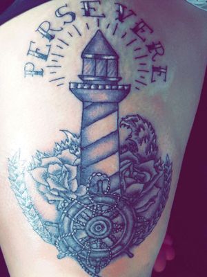 This was done by Trey Harris in a little town at his shop called Yoakum Ink (In Texas). I got this tattoo as a reminder that while I'm steering through treterous  waters in life to preserver because there is always a light house nearby to light my way back home 