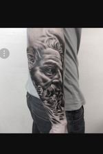 Greek god arm tattoo