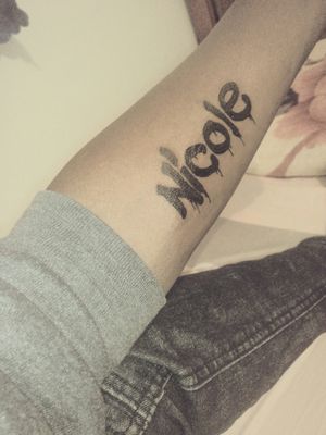 Nicole name arm tatoo.. my daughter 😍