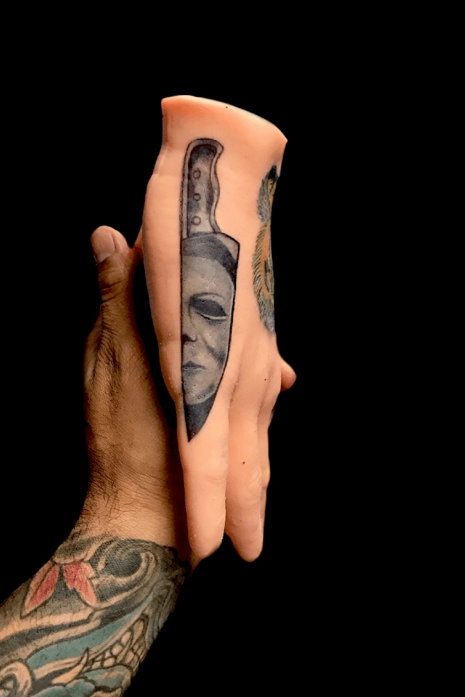 Black and gray Michael Myers hand tattoo  Michael myers tattoo Micheal  myers tattoo Michael myers