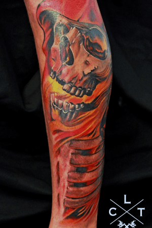 Color tattoo. Skull tattoo. Fantasy tattoo. Arm tattoo.