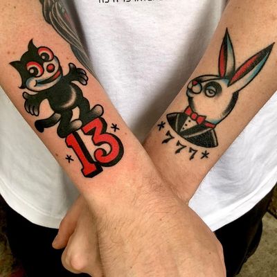 Tattoo by Eli Quinters #EliQuinters #matchingtattoos #pairtattoos #pairs #matching #color #traditional #felixthecat #cat #13 #bunny #playboybunny #numbers
