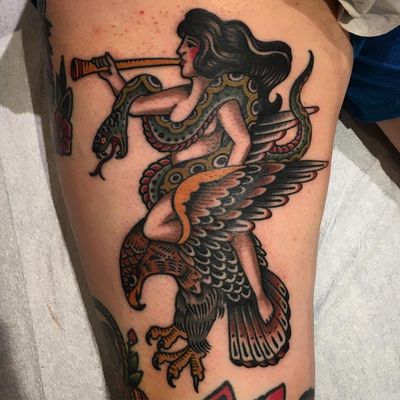 Tattoo by Paul Dobleman #PaulDobleman #pinuptattoos #pinup #lady #babe #girl #traditional #color #eagle #snake