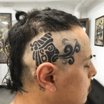 Aztec design on the side of the head 