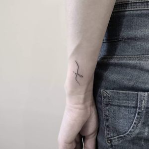 So minimalistic ❤️💯 Instagram : @nikita.tattoo #tattooartist #tattooart #blackworktattoo #blackwork #lineworktattoo #Linework #lettering #letters #phrases #words #minimalism #minimalistic #minimalistictattoo #tattooideas 