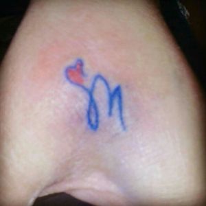 Tiny initial I did for my friend stormy seven or eight years back on the hand.