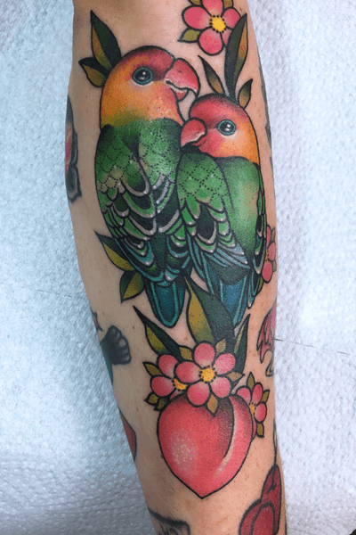 Love birds on forearm