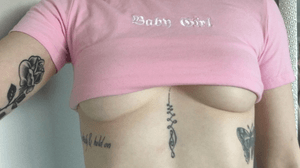 sternum and rib tattoos done at central victoria tattoos, kilmore, and the rose on my inner arm was done at heretic tattoos, brunswick by tristan trenaman