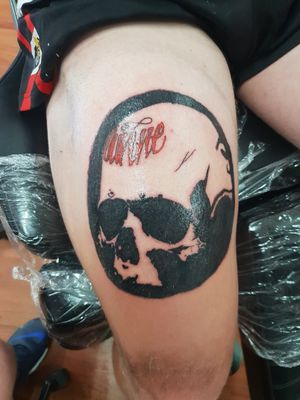 Tattoo by Rogue Skull Tattoo