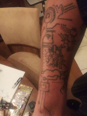 Circuit board tat with glow in the UV glow in the dark ink outline. Looks awesome all lit up. 