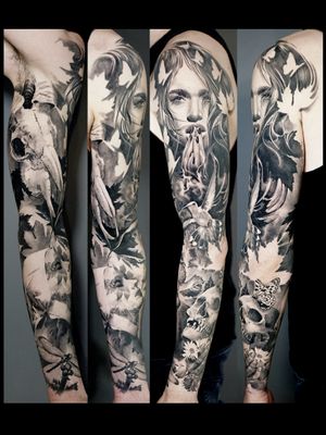 Black and grey healed full sleeve tattoo of life and death www.alolocotattoo.com