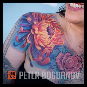 Flowers that pop. Full color. Chest piece still in progress. 