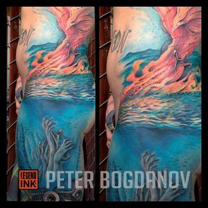 full color under water and above sea tattoo. Phoenix 