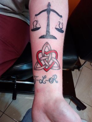 TLR = Trust Loyalty Respect Celtic sign with a heartScales of justice with life and death symbols